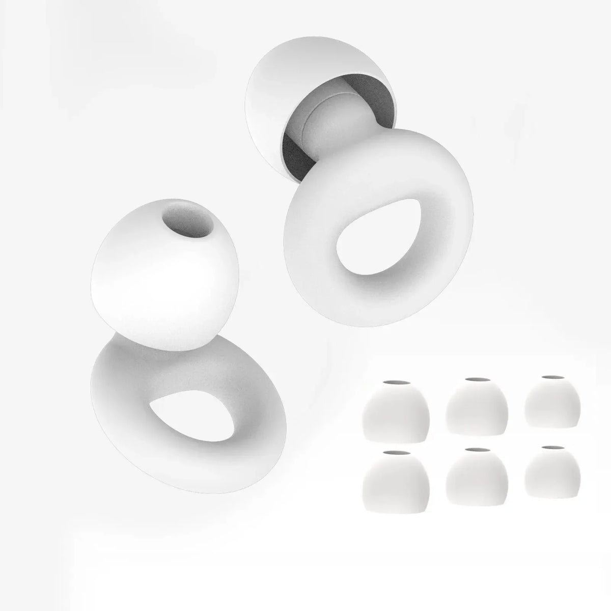 A set of white silicone earplugs shown in various sizes and an open plug.