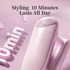 A pink deep V wave curling wand is shown on a light purple surface with text about styling lasting all day.