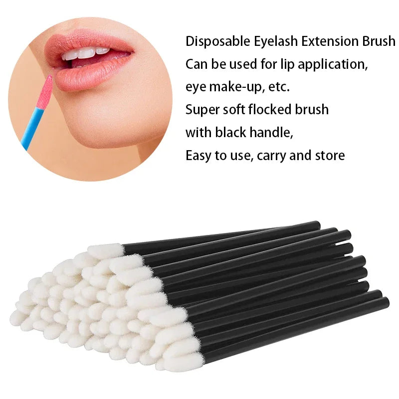 A set of disposable eyelash extension brushes with black handles and white flocked tips.