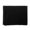 Black exfoliating mesh body scrub sponges.