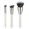 A set of three professional makeup brushes with silver ferrules and natural hair bristles