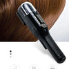 A black hair trimmer is shown being used on a person's hair, highlighting its slim design and features.