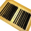 A box of lash clusters showing various lengths and styles of black false eyelashes for DIY eyelash extensions.