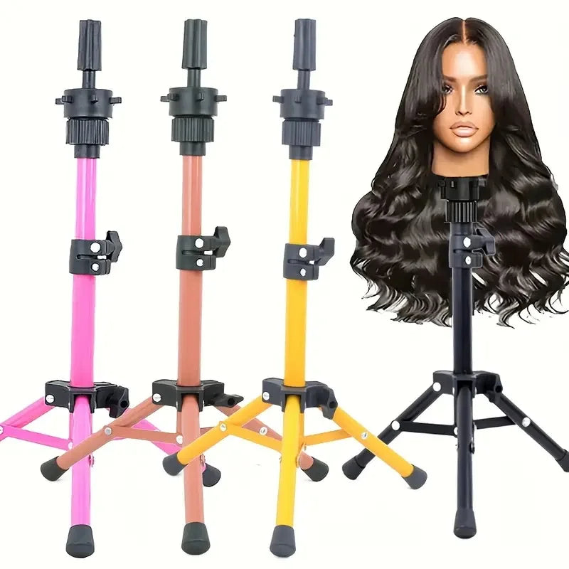 A set of adjustable wig stands and a long black hair wig displayed on a tripod stand.