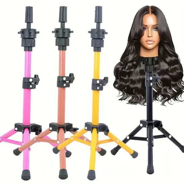 A set of adjustable wig stands and a long black hair wig displayed on a tripod stand.