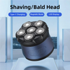 A close-up view of a dark blue electric shaver head with five rotating blades, displayed on a clear glass surface.