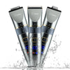 Three metallic gray electric grooming trimmers are shown splashing water on a white surface.