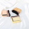 A set of gold and rose gold makeup brushes for tan and foundation application