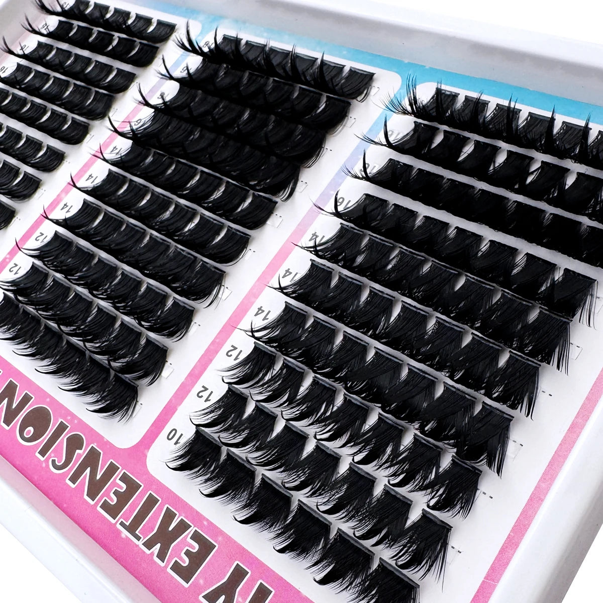 A display of black mega wispy lash clusters for dramatic volume eyelash extensions.