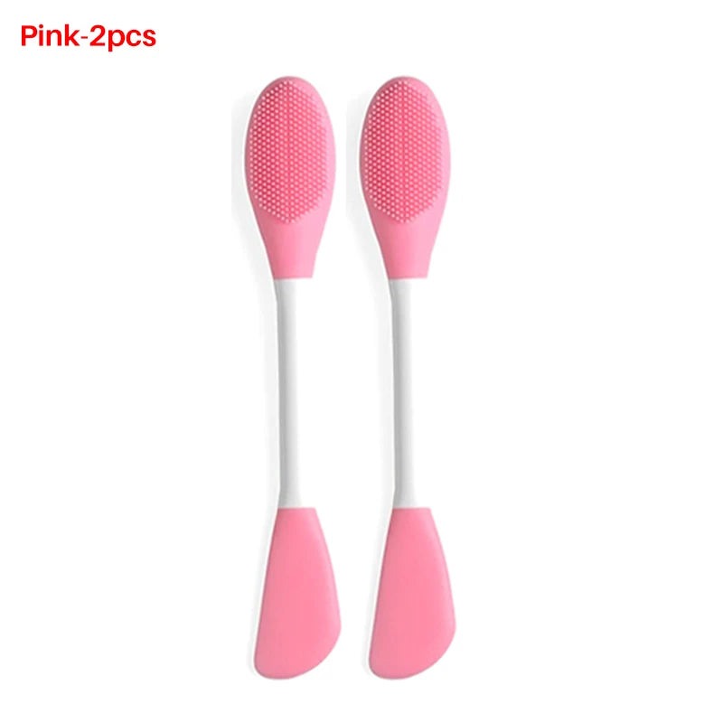 Two pink silicone facial brushes for exfoliation