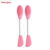 A pair of pink silicone facial mask applicators shown against a white background.