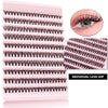 A pink plastic tray holding individual lash clusters for eyelash extensions.