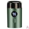 A close-up of a green electric shaver with a black top and a digital display showing 98.