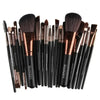 A collection of 22 professional makeup brushes with synthetic bristles displayed together.