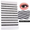 A set of individual black false eyelashes in various densities displayed in a white plastic case.