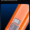 An orange professional USB nose hair trimmer with a digital display showing 100% battery level.