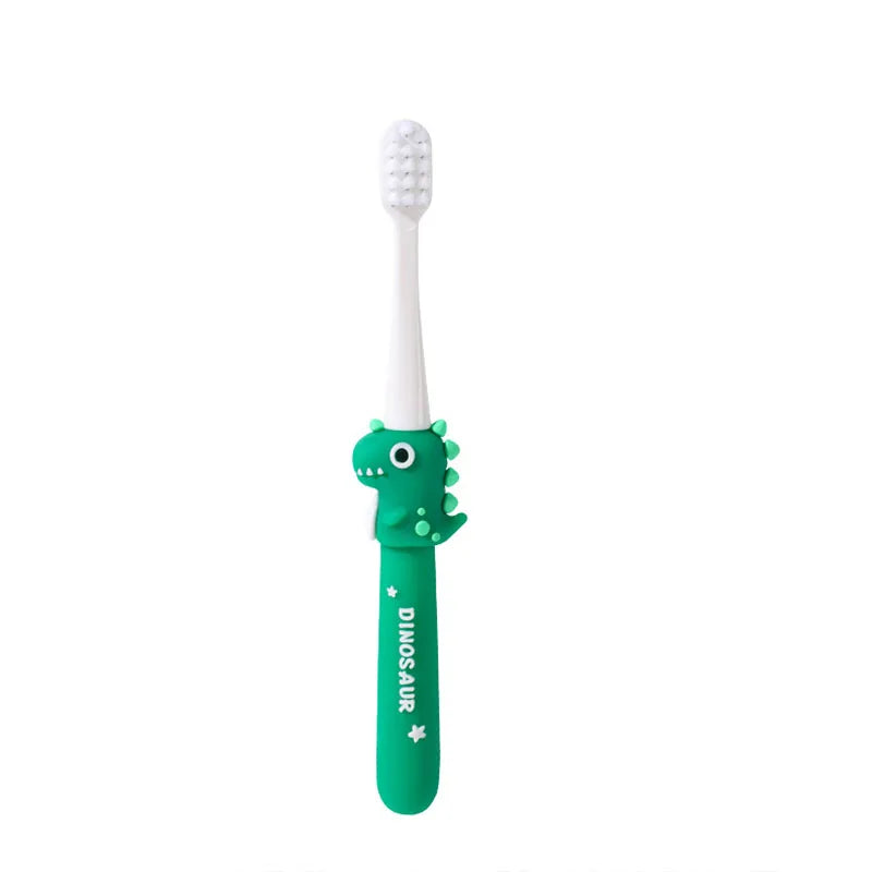 A green cartoon dinosaur shaped toothbrush for kids