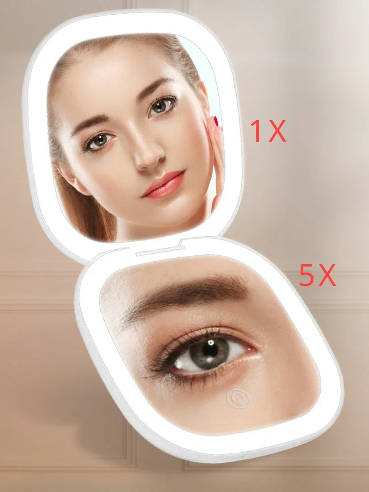A compact LED makeup mirror showing a woman's face with 5x magnification.