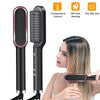 A woman is using a black heated straightening and curling comb on her hair.