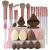 A complete makeup brush set featuring various sizes of synthetic bristles and sponges in shades of pink, brown, and nude.
