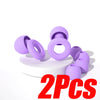 Two purple silicone noise-canceling earplugs shown on a white surface.
