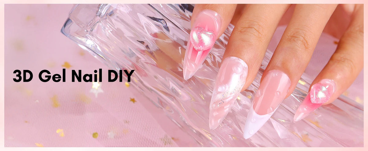 Close-up of a hand displaying 3D gel nail DIY art on fingers against a pink background.