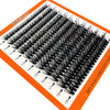 A tray of mixed false eyelashes showing various lengths and styles for natural eye enhancement.