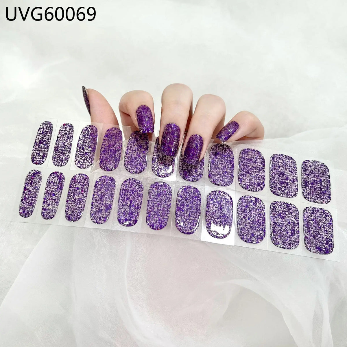 Purple UV gel nail stickers for full coverage decals applied to fingernails.