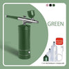 A green portable airbrush set with a metal nozzle and feeding pot, shown against a light green background.