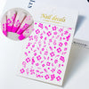 A sheet of pink nail decals featuring various floral designs like hibiscus and leaves for professional use.