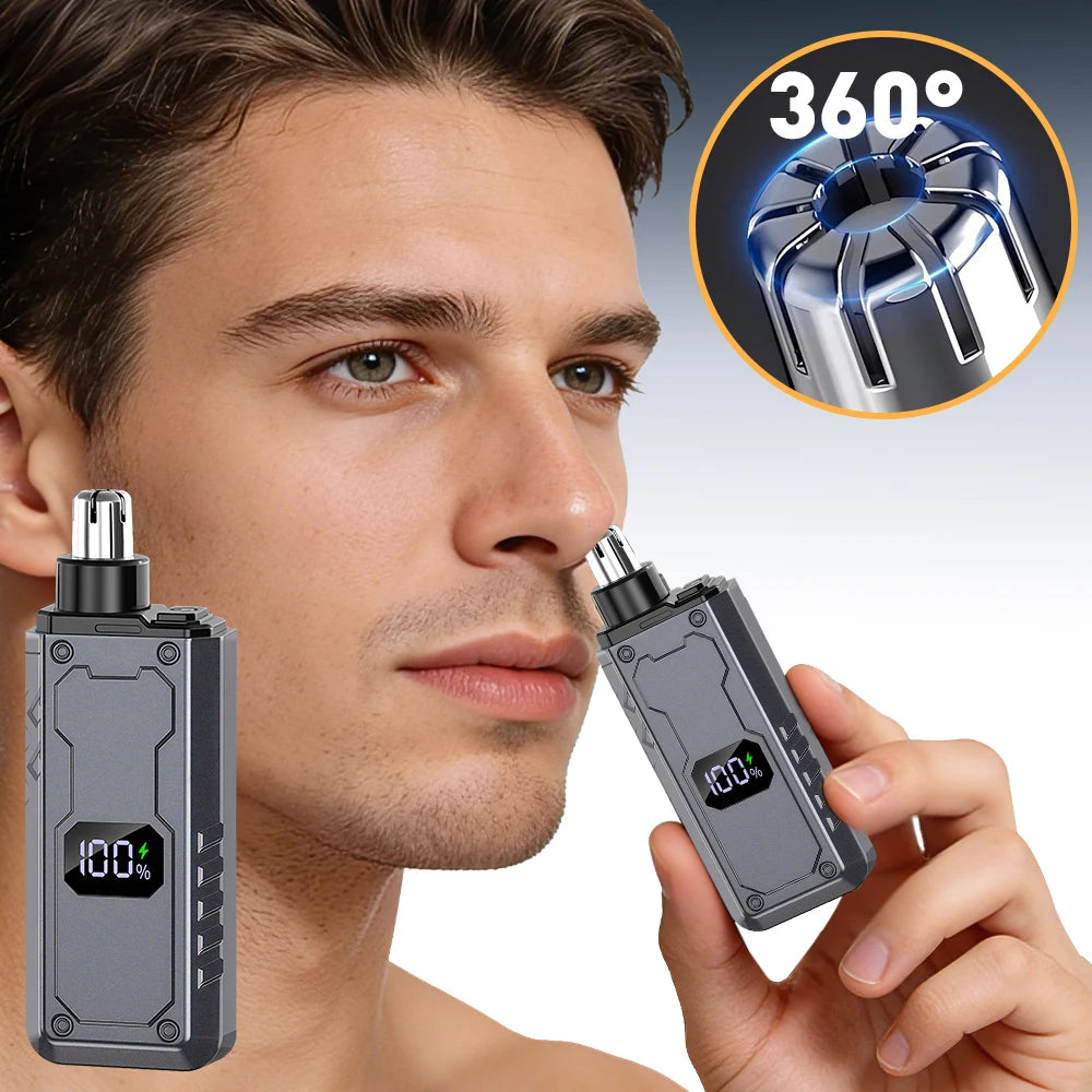 A man is holding a portable electric nose hair trimmer device, showing its design and usage.