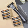 A stainless steel safety razor with a black handle and replaceable triple-blade heads is shown next to its packaging.