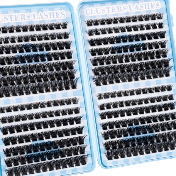 A pair of blue and black lash extension clusters displayed in a clear plastic case.