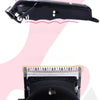 A black professional cordless hair clipper is shown from the side, highlighting its design.