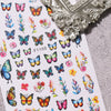A collection of colorful flower and butterfly nail stickers for DIY decoration
