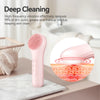 A pink sonic facial cleansing brush is shown next to a white sink, demonstrating its use for deep cleaning.