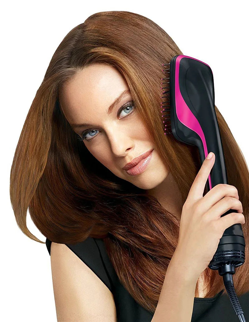 A woman is using a pink and black professional hair dryer brush and curling comb on her brown hair.