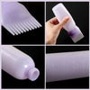 A purple hair color applicator bottle and a fine-tooth comb are shown in various angles.
