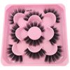 A pink tray containing a set of black artificial mink eyelashes for eye extensions.