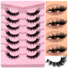 Una bandeja de plástico rosa mostrando varios estilos de pestañas postizas de zorro negro para ojos.