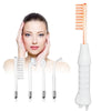 A white high-frequency electrotherapy wand with multiple attachments, including a comb and spoons, shown next to a woman's fa