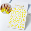 Yellow hibiscus flower nail decals for fashion and professional use displayed on a white card.