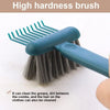 A teal high hardness brush with a wooden handle is shown cleaning hair or fabric.