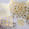 Gold star nail art stickers featuring intricate 3D decals for acrylic nails