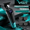 VGR Voyager Profi-Trimmer mit schwarzem Schutz und mehreren Aufsätzen auf dunkler Oberfläche.