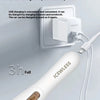 A white portable USB charging device is shown next to a hair trimmer cable.