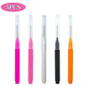 A set of five mini brow and eyelash combs in pink, white, black, and orange colors.