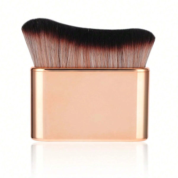 Pinceau corporel portable self-tanning ton doré avec poils synthétiques noirs et denses.