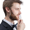 A man is using a professional beard shaping ruler and styling comb set to style his beard.