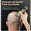 A hand is using an electric hair clipper to shave the scalp, demonstrating its 0.1mm safe shaving capability.